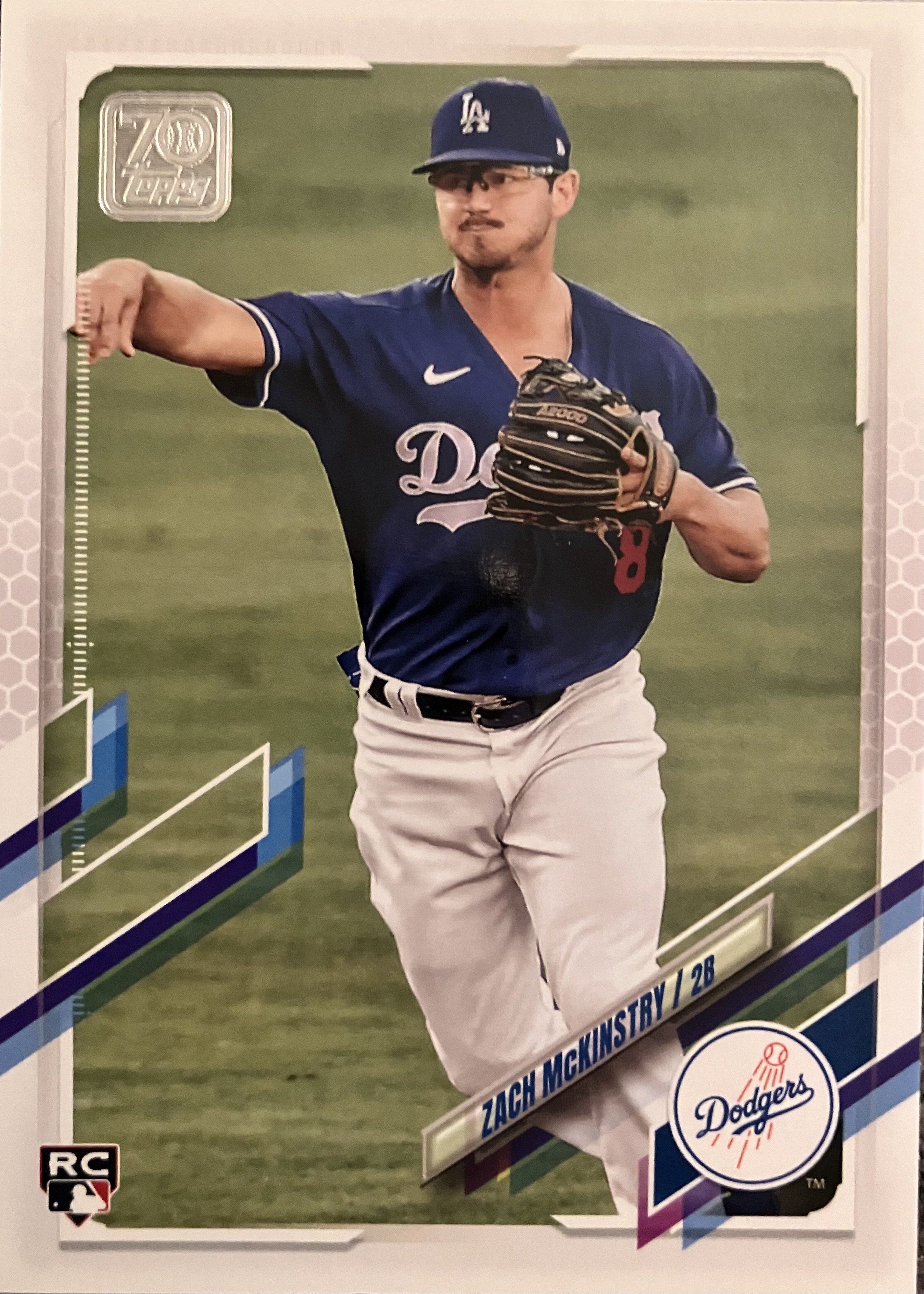 A baseball player throws a ball.