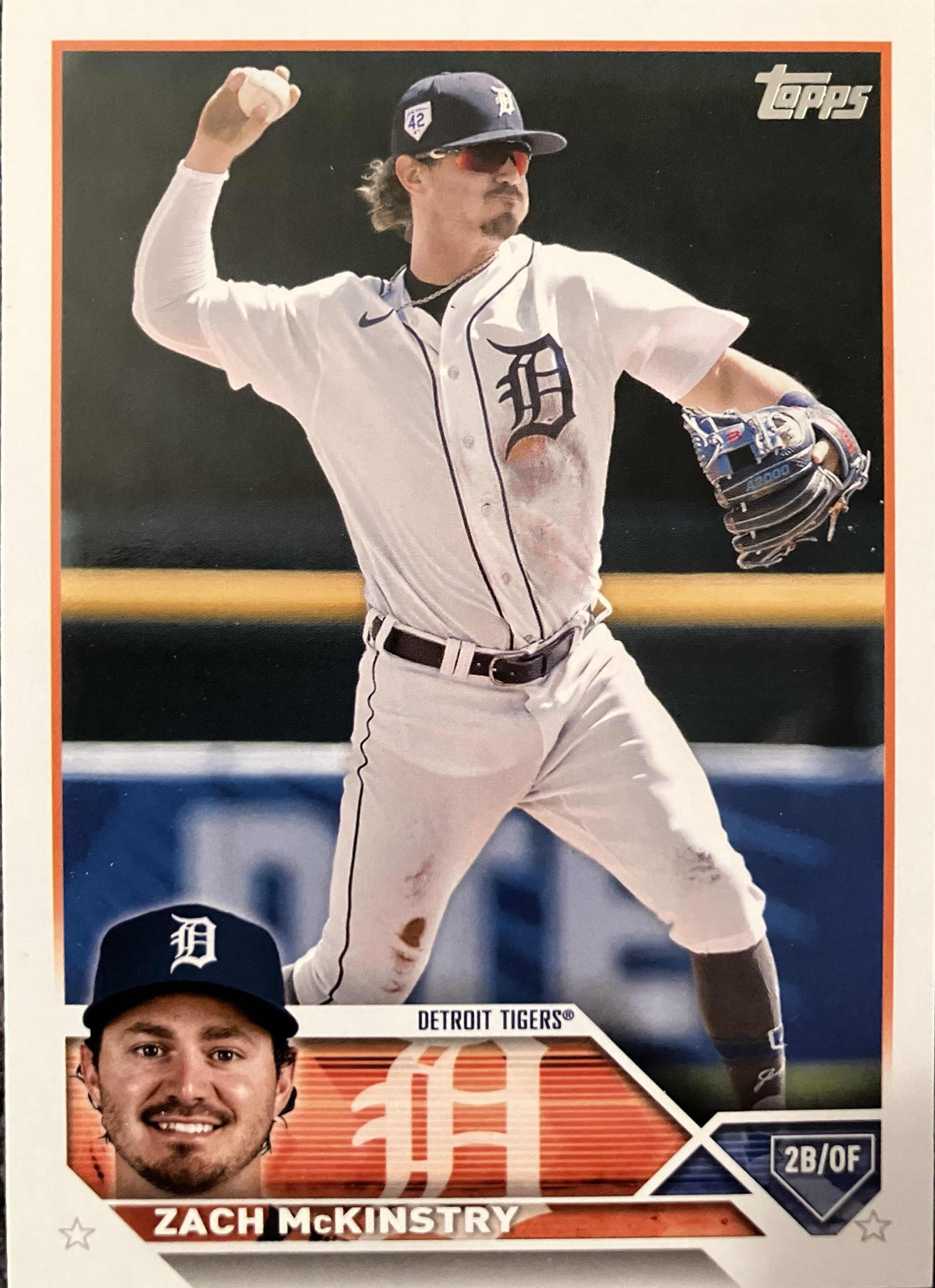 A baseball player throws a ball.