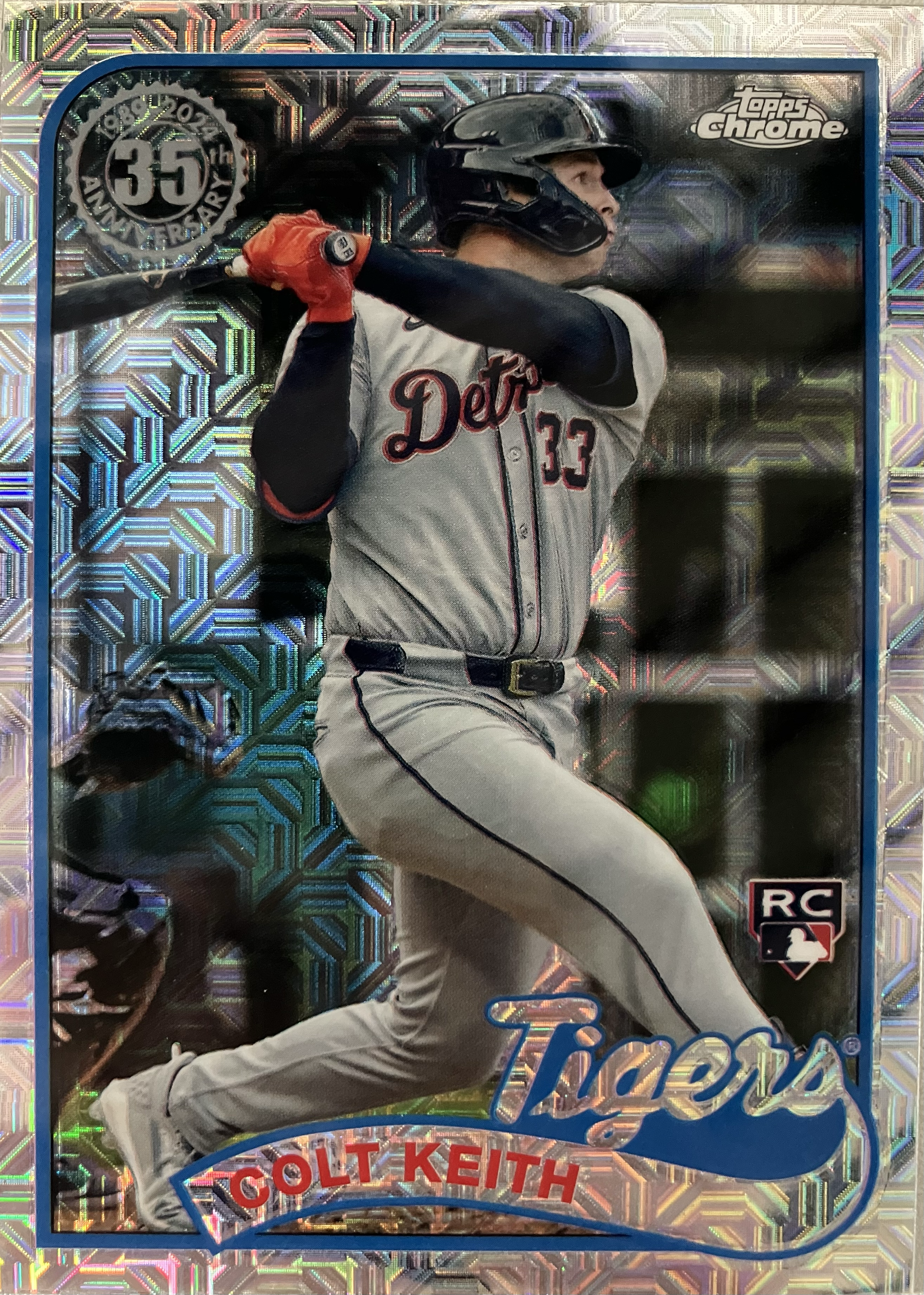 A baseball player stares into left field after after just hitting the ball.