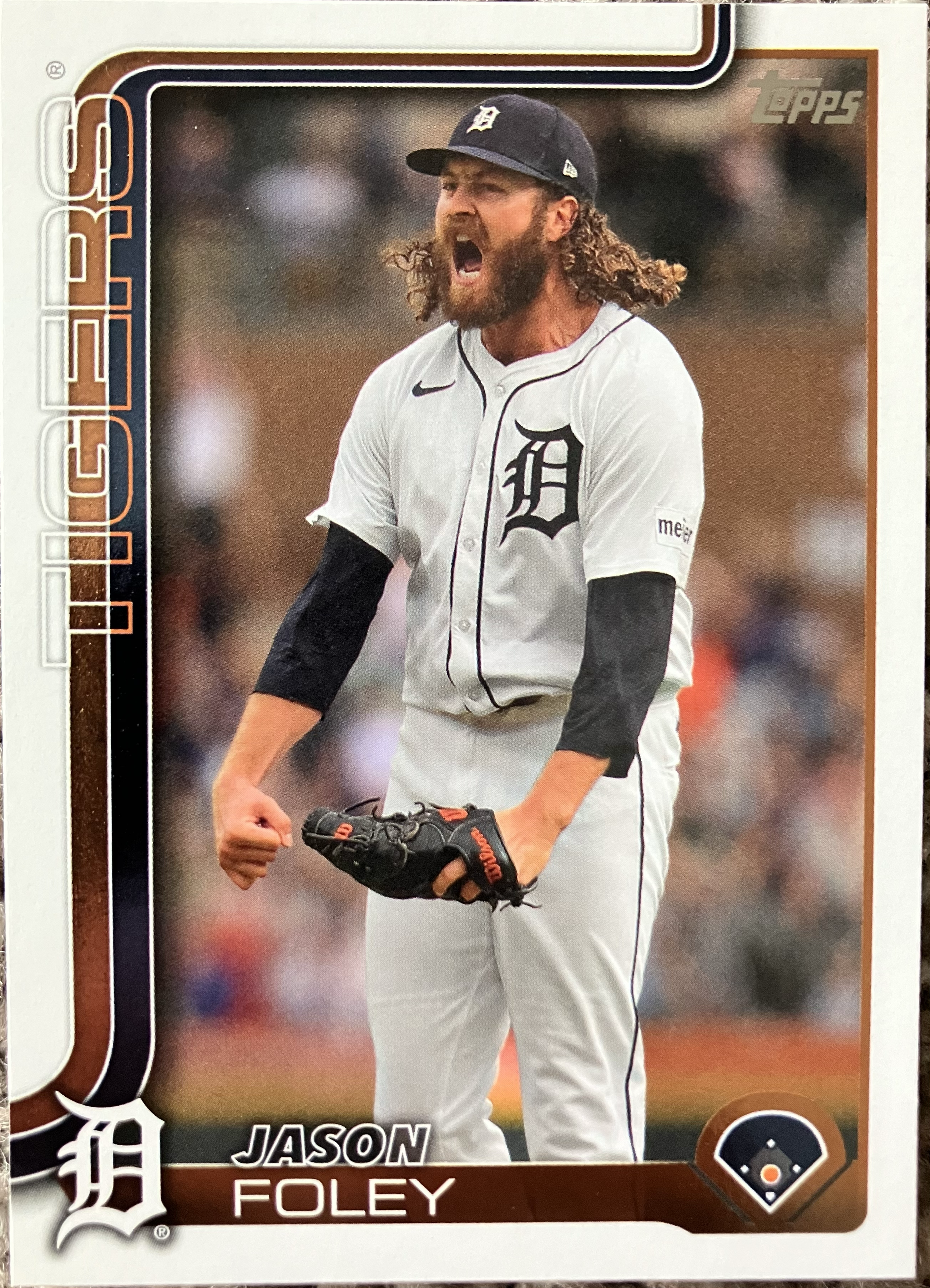 A pitcher shouting in celebration.